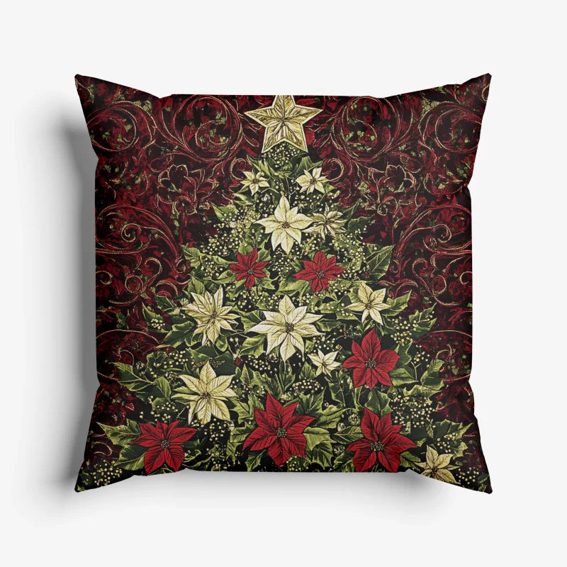 Sierkussen met een kerstboom van bloemen en rijke rode tinten.