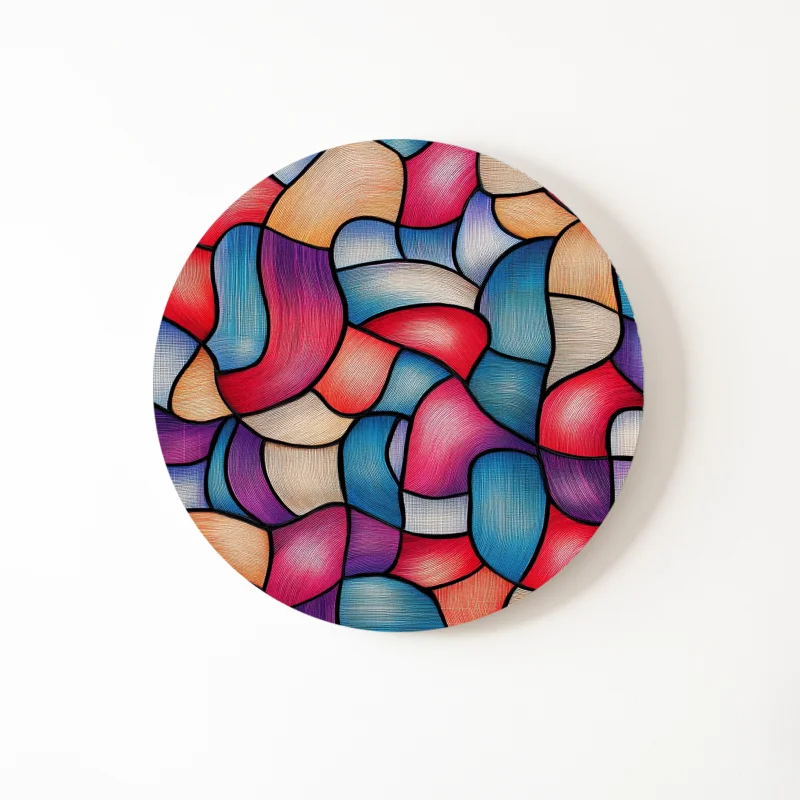 Dibond muurcirkel met abstracte vormen in felle kleuren.