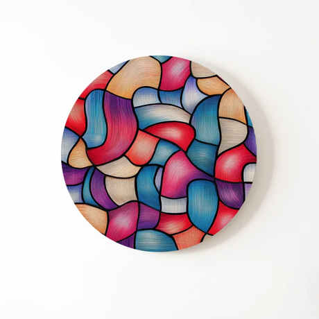 Dibond muurcirkel met abstracte vormen in felle kleuren.