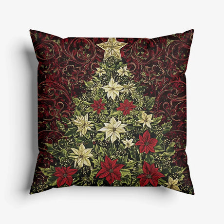 Sierkussen met een kerstboom van bloemen en rijke rode tinten.